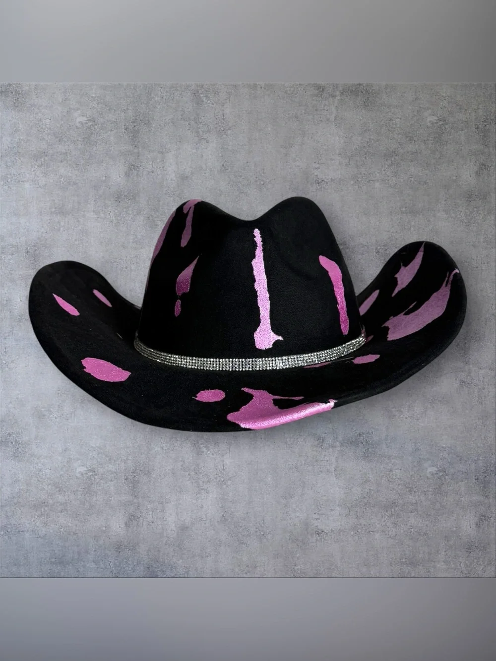 Black Cowboy Hat with Pink Accents and Star Embellishments